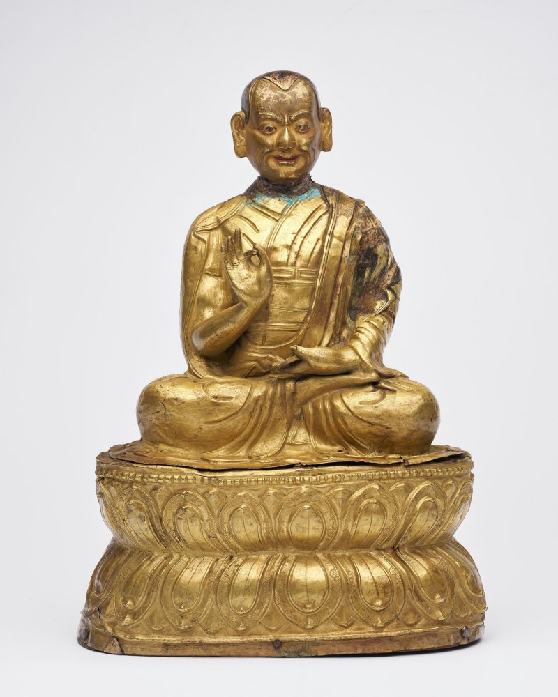 十八世紀 鎏金錘揲喇嘛像 | A GILT REPOUSSE FIGURE OF A LAMA - 图1