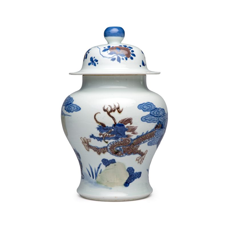A pair of Chinese underglaze-blue, copper-red and celadon-glazed 'Dragon and Tiger' vases and covers - 图2
