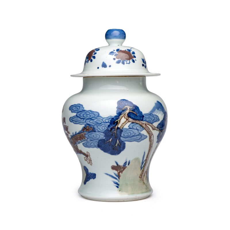 A pair of Chinese underglaze-blue, copper-red and celadon-glazed 'Dragon and Tiger' vases and covers - 图3