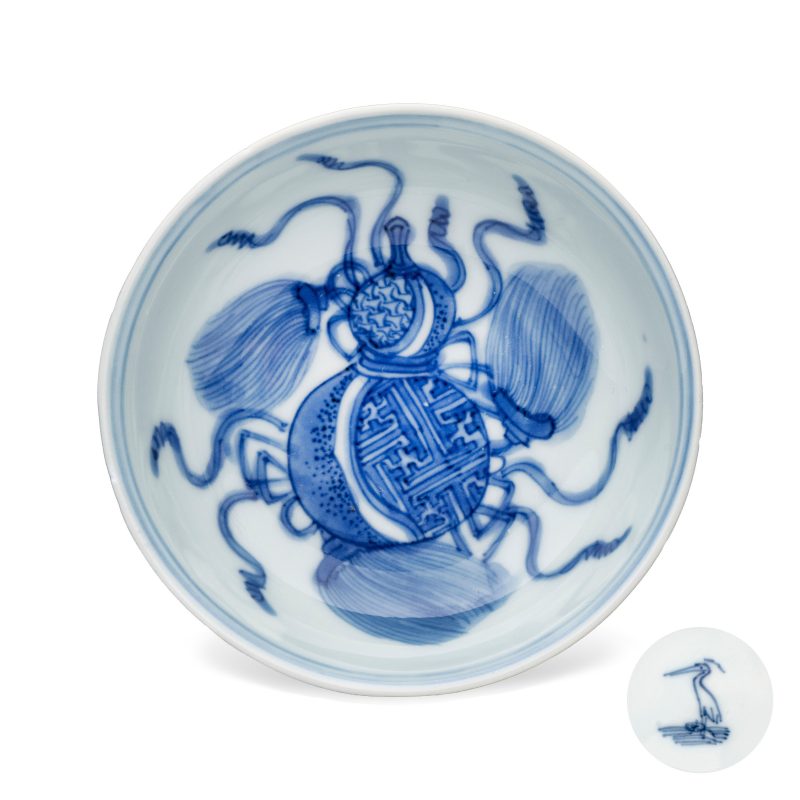 A very rare Chinese blue and white 'Double Gourd' shallow bowl