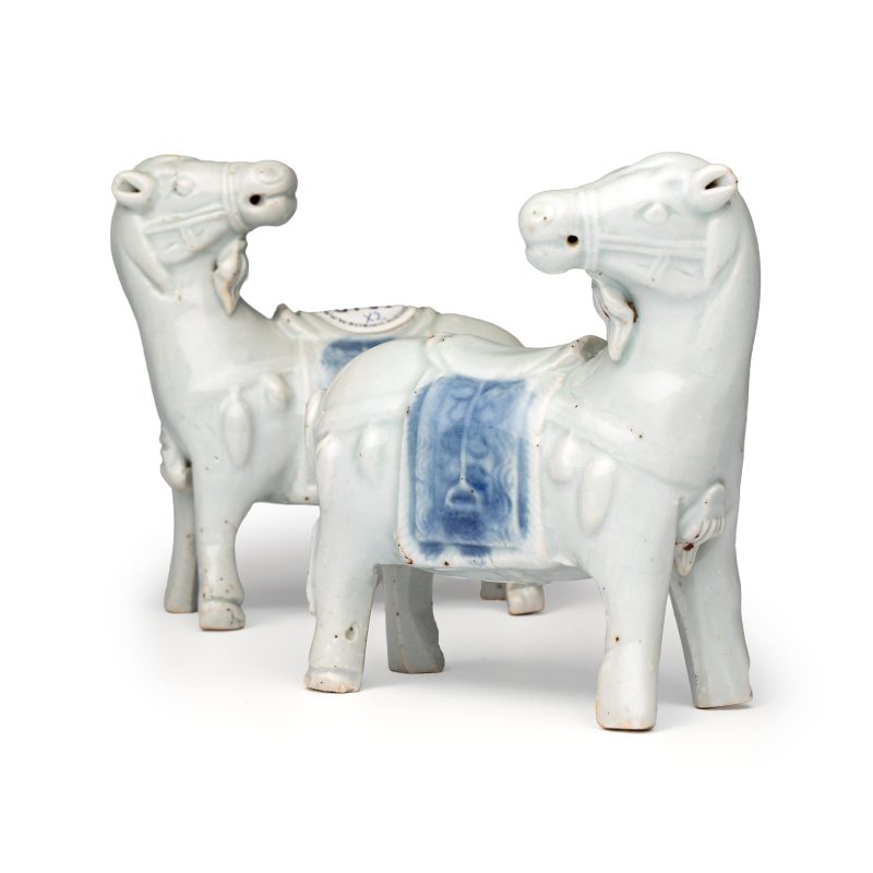 A pair of Chinese blue and white models of horses