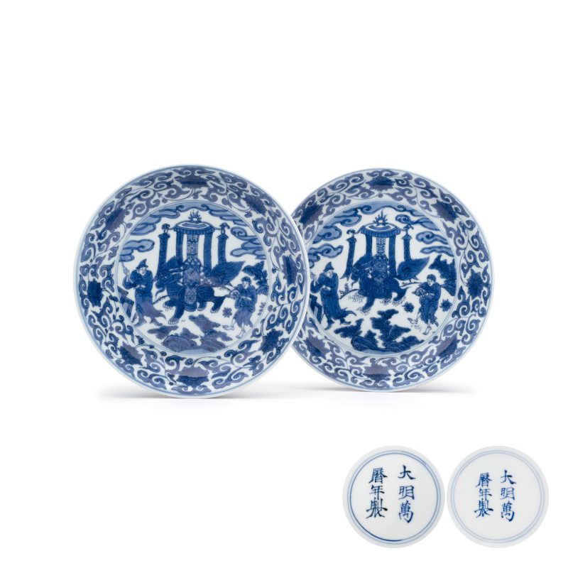 An extremely rare pair of Chinese blue and white 'Foreigners Presenting Treasures' plates