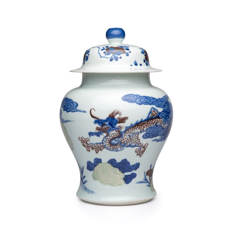 A pair of Chinese underglaze-blue, copper-red and celadon-glazed 'Dragon and Tiger' vases and covers - 图10