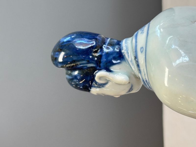 A Chinese blue and white seated figure of Wenchang - 图20