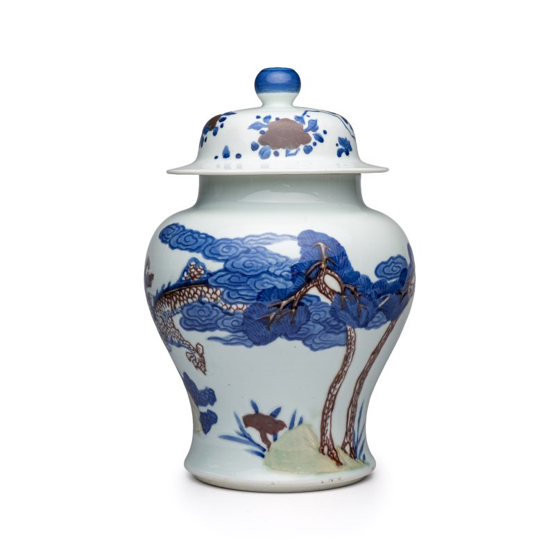 A pair of Chinese underglaze-blue, copper-red and celadon-glazed 'Dragon and Tiger' vases and covers - 图11