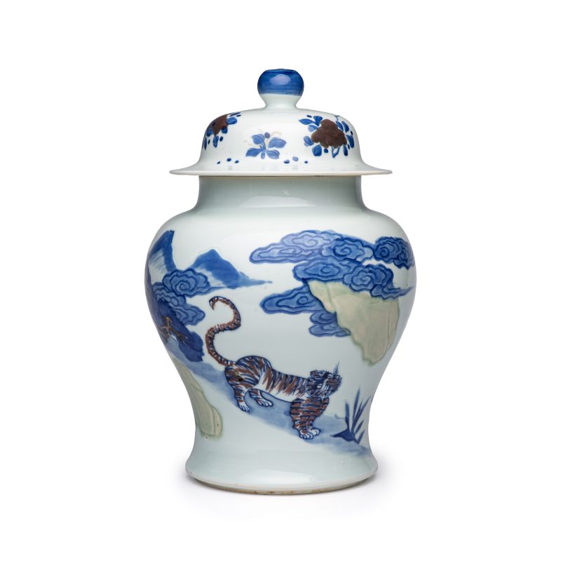 A pair of Chinese underglaze-blue, copper-red and celadon-glazed 'Dragon and Tiger' vases and covers - 图13