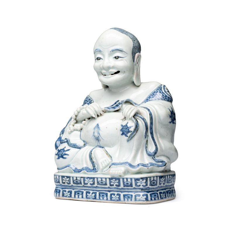 A Chinese blue and white figure of Budai - 图3