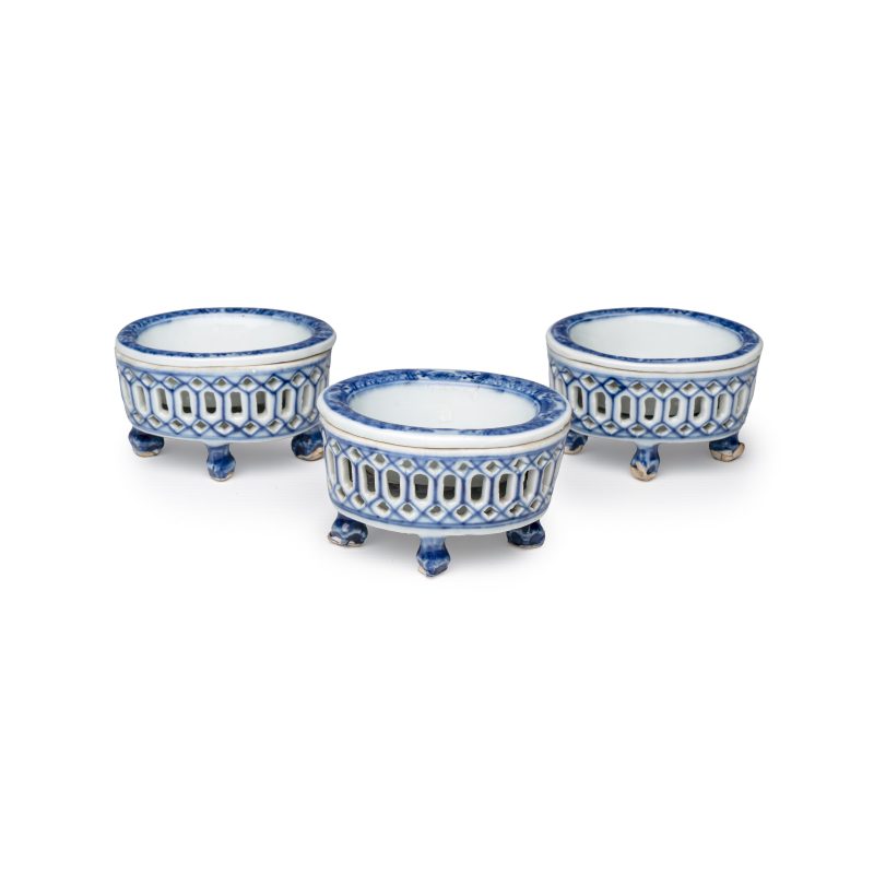 Three Chinese blue and white reticulated salts after European silver models