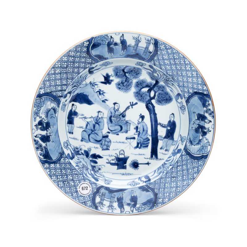 A Chinese blue and white 'Musicians in a Garden' dish