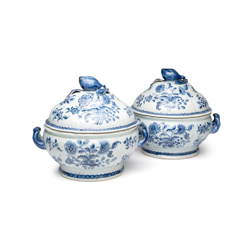 A pair of Chinese blue and white covered tureens with floral design