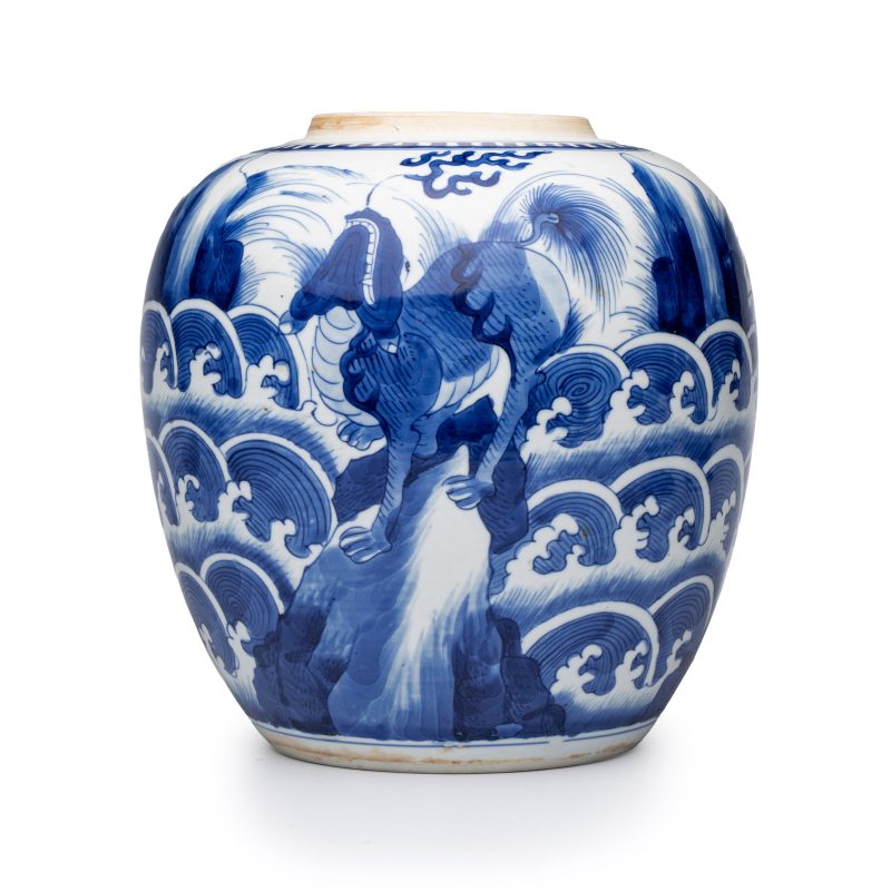 A pair of Chinese blue and white 'Mythical Beast' jars with later wooden covers and stands - 图17