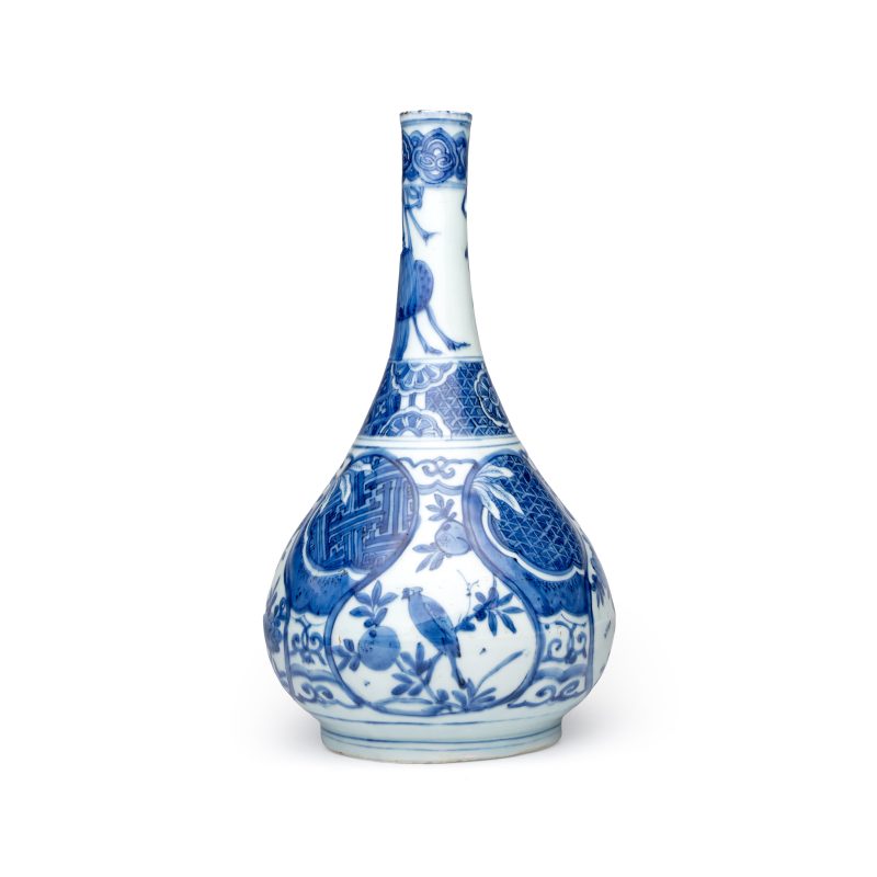 A Chinese blue and white 'Bird among Flowering Branches' bottle vase