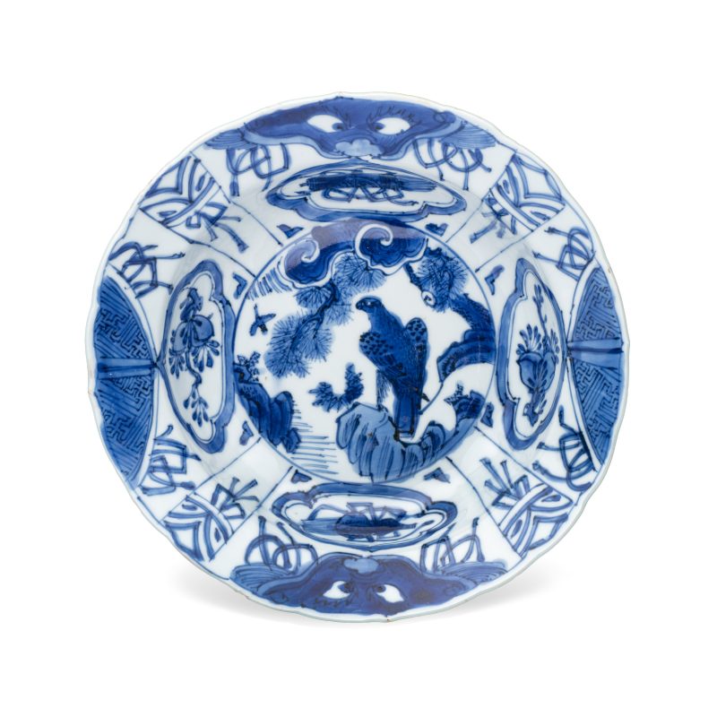 A Chinese blue and white 'Klapmuts' bowl with a bird of prey
