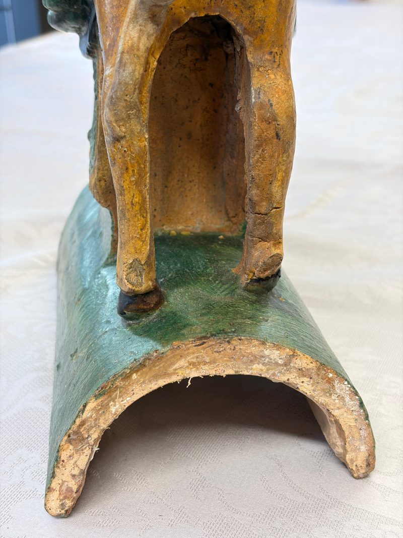 A pair of Chinese sancai-glazed stoneware 'Horseriders' roof tiles on later wooden stands - 图37