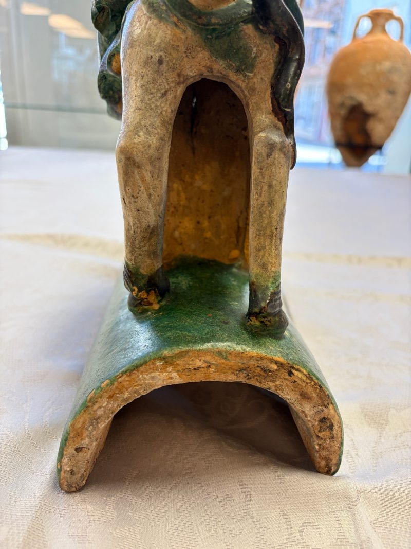 A pair of Chinese sancai-glazed stoneware 'Horseriders' roof tiles on later wooden stands - 图24