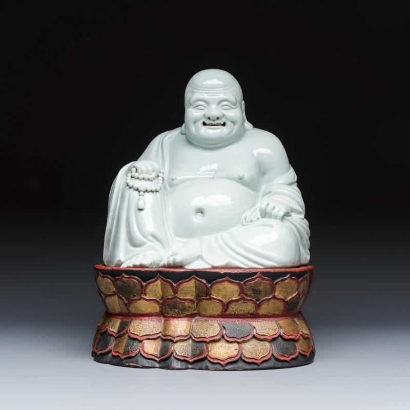 A Chinese white-glazed Milefo Buddha on a gilt-lacquered wooden lotus throne - 图2