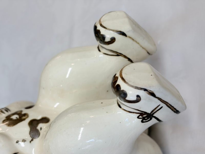 A Chinese Cizhou figure of a seated boy - 图15