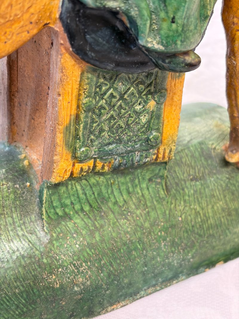 A pair of Chinese sancai-glazed stoneware 'Horseriders' roof tiles on later wooden stands - 图40