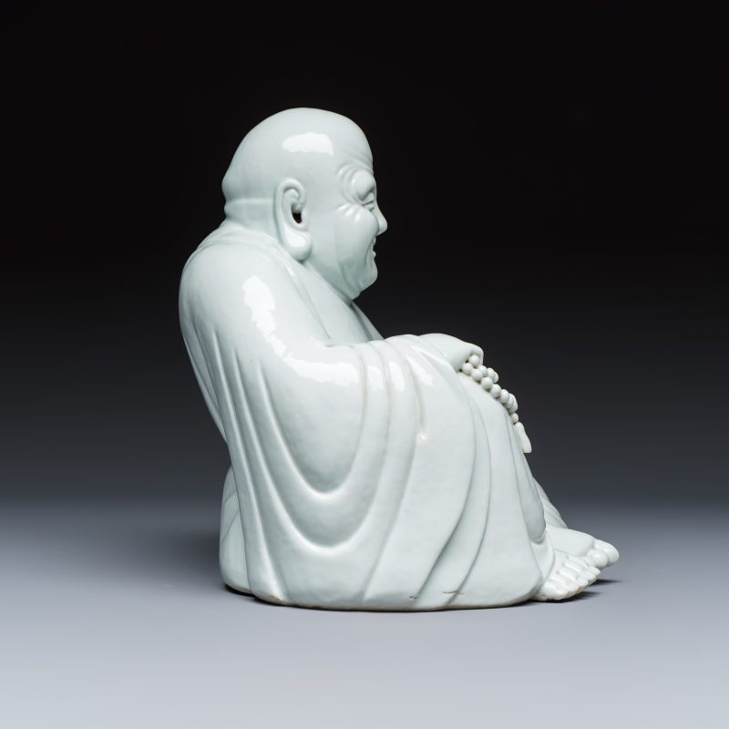 A Chinese white-glazed Milefo Buddha on a gilt-lacquered wooden lotus throne - 图6