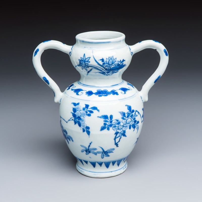 A Chinese blue and white double-handled vase with floral design