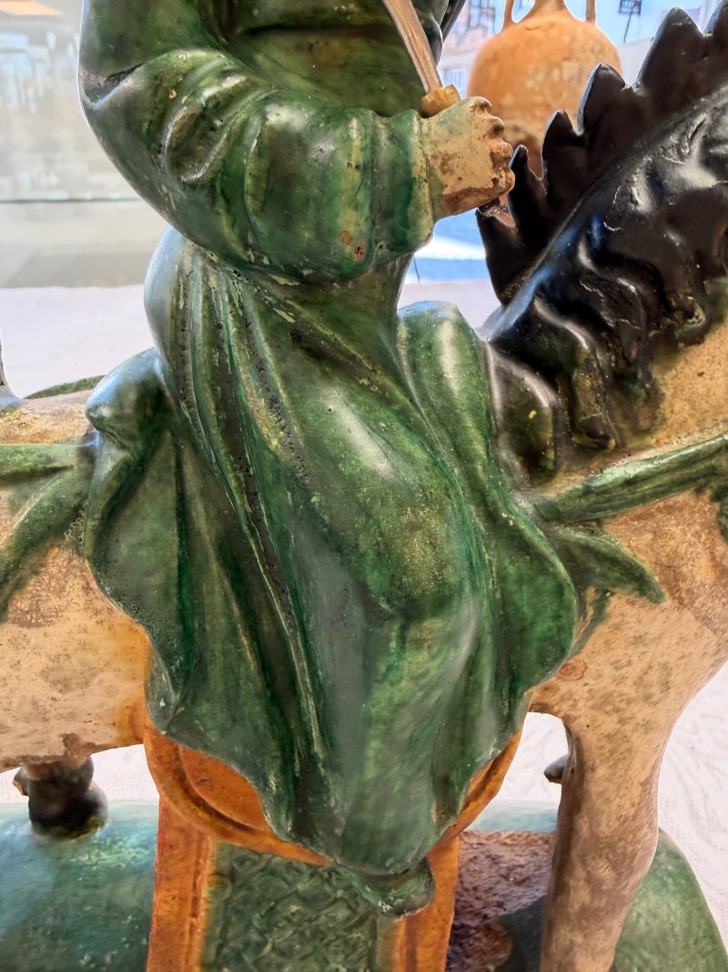 A pair of Chinese sancai-glazed stoneware 'Horseriders' roof tiles on later wooden stands - 图14