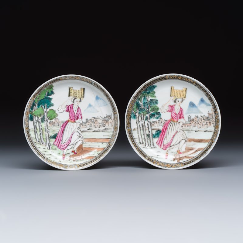 A pair of Chinese famille rose 'Milkmaid' saucers