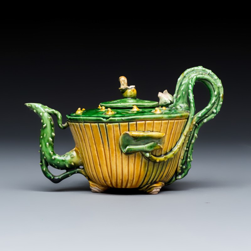 A Chinese famille verte sancai biscuit 'Lotus' teapot on a later wooden stand - 图2