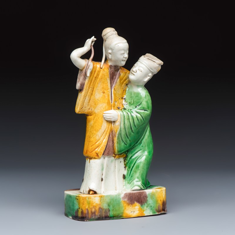 A Chinese famille verte sancai biscuit group of a man embracing a lady - 图1