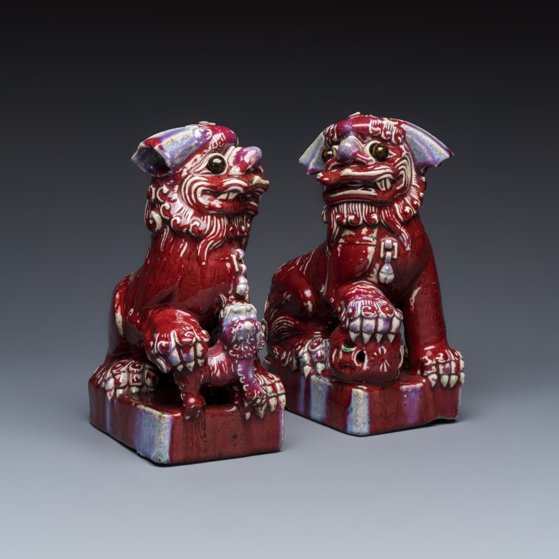 A pair of Chinese flambé-glazed models of Buddhist lions - 图1