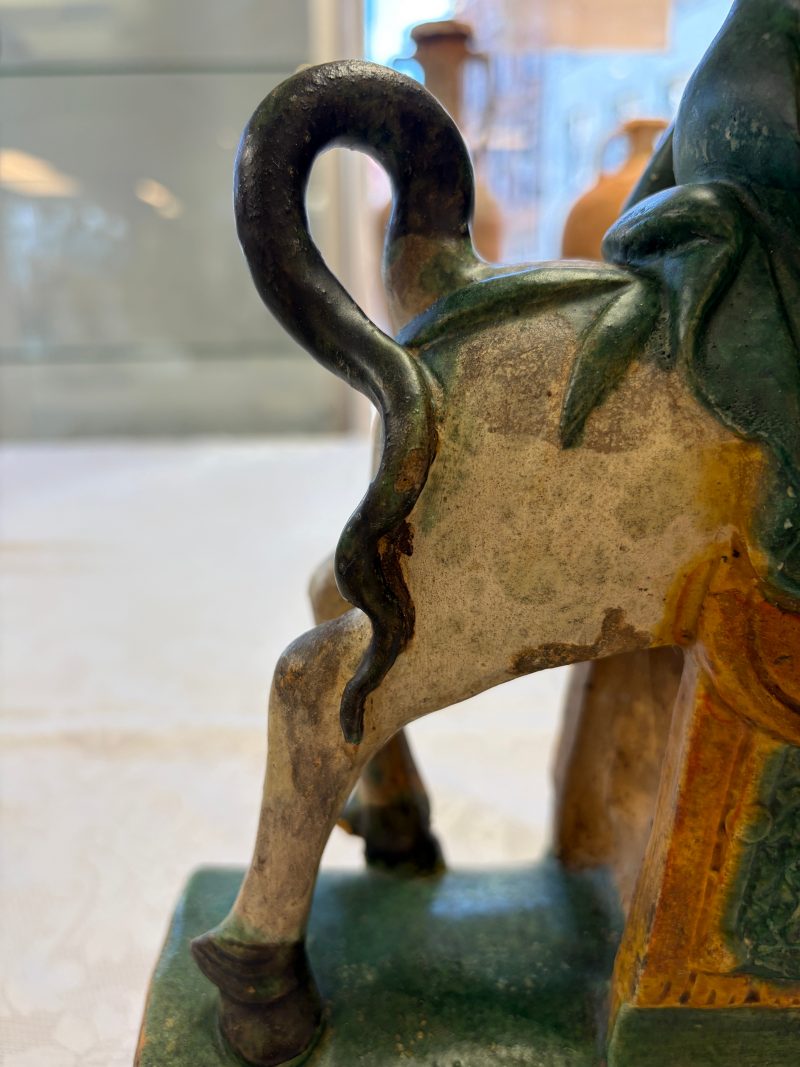 A pair of Chinese sancai-glazed stoneware 'Horseriders' roof tiles on later wooden stands - 图15