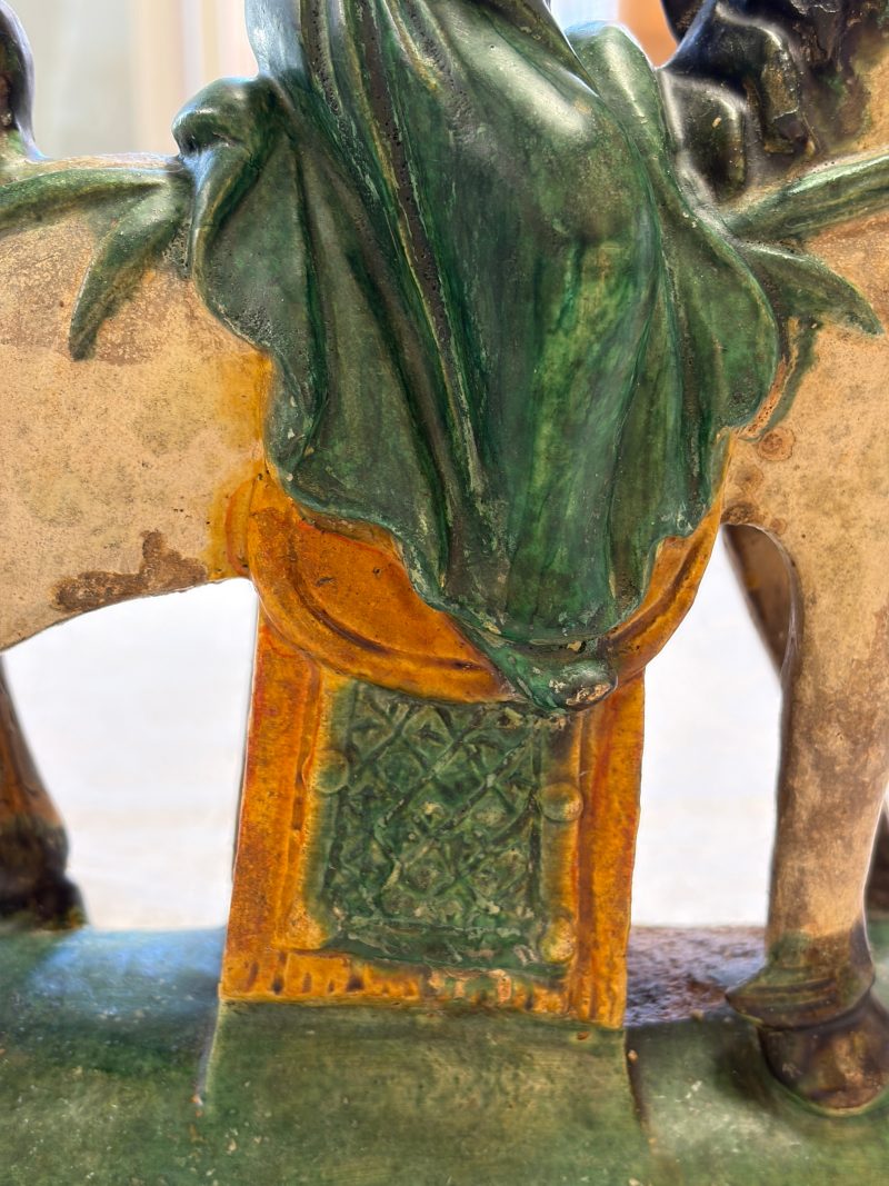 A pair of Chinese sancai-glazed stoneware 'Horseriders' roof tiles on later wooden stands - 图16