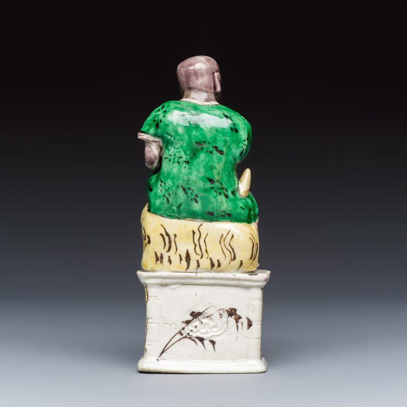 A Chinese famille verte sancai biscuit model of a seated Luohan on a tiger - 图4