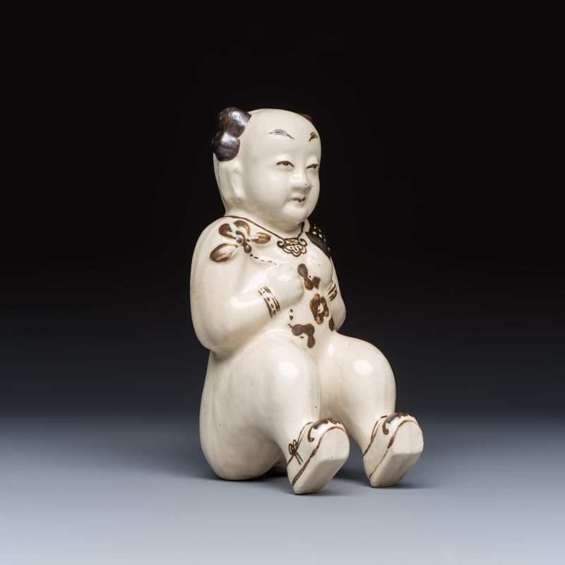 A Chinese Cizhou figure of a seated boy - 图1