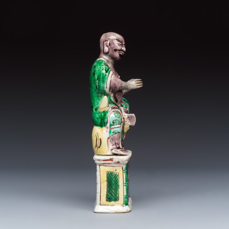 A Chinese famille verte sancai biscuit model of a seated Luohan on a tiger - 图5