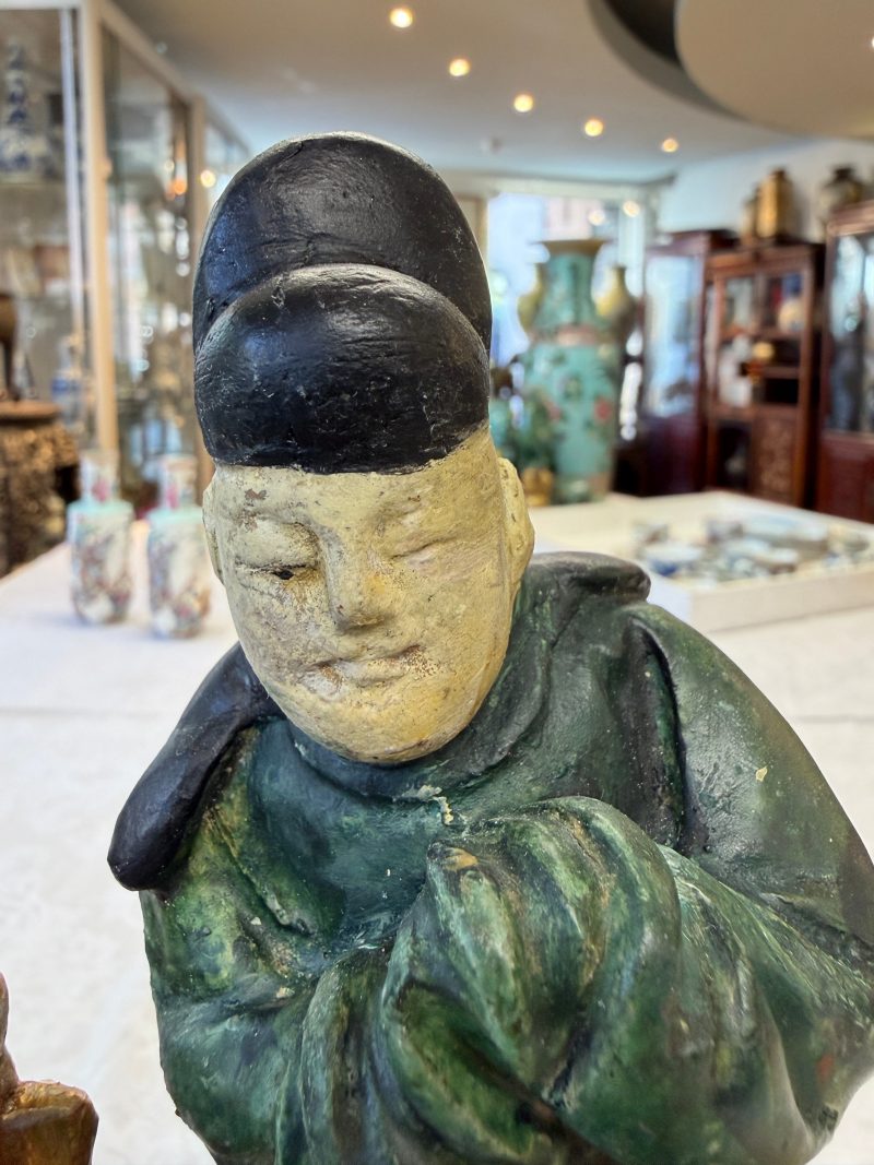 A pair of Chinese sancai-glazed stoneware 'Horseriders' roof tiles on later wooden stands - 图28