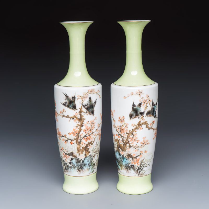 A pair of Chinese polychrome semi-eggshell 'birds among blossoming plum branches' vases