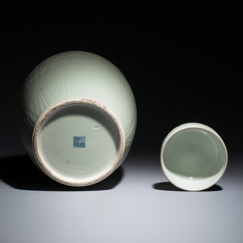 A Chinese celadon-glazed covered vase with floral relief design - 图7