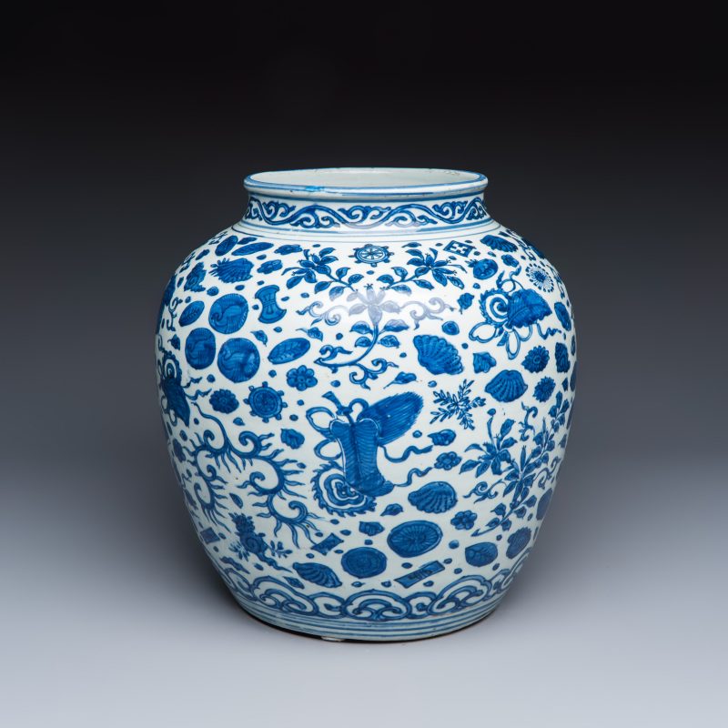 A large Chinese blue and white jar with Buddhist symbols, shells and insects