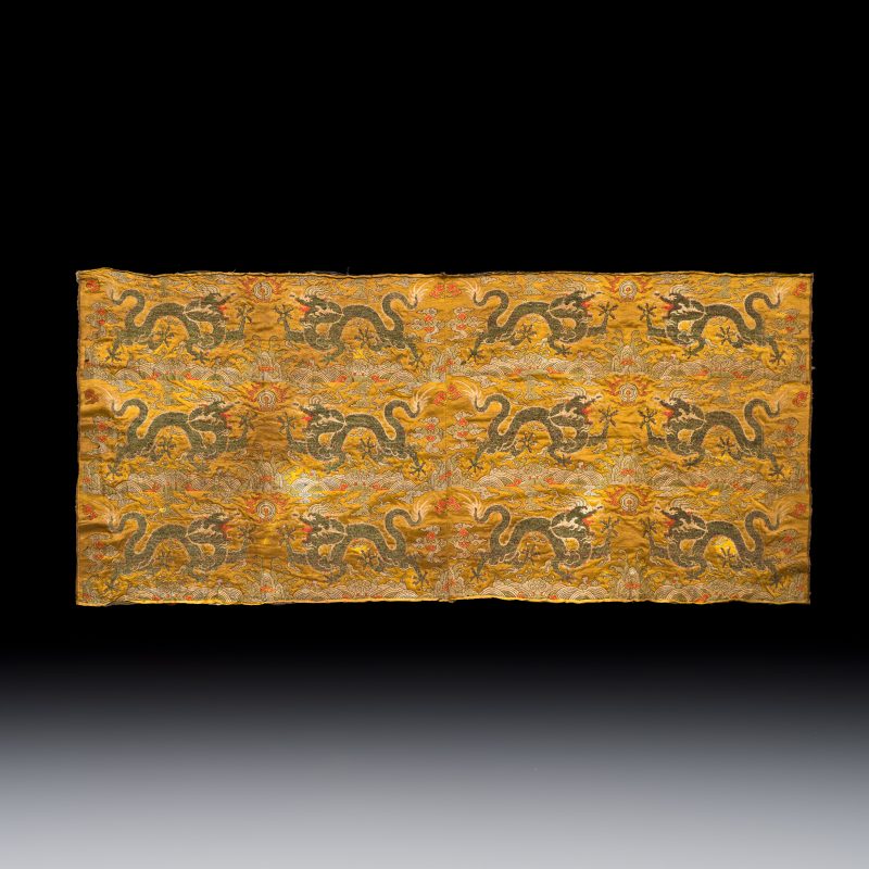 A rare Chinese peacock-feather brocade 'Dragons amid Clouds and Waves' panel