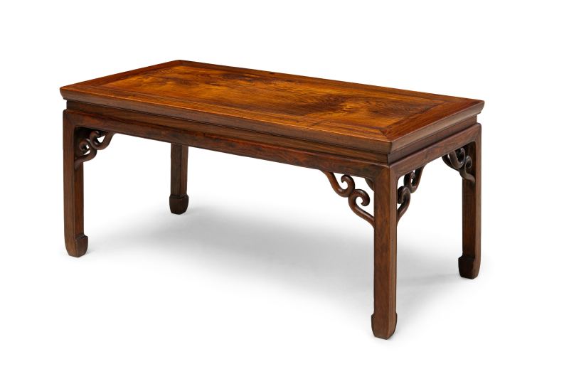 A huanghuali low corner-leg table