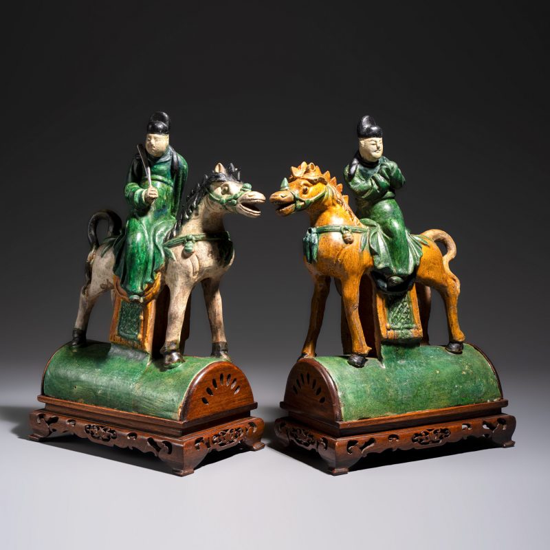 A pair of Chinese sancai-glazed stoneware 'Horseriders' roof tiles on later wooden stands - 图2