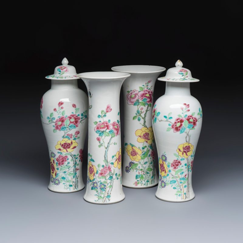 A Chinese famille rose four-piece garniture with floral design