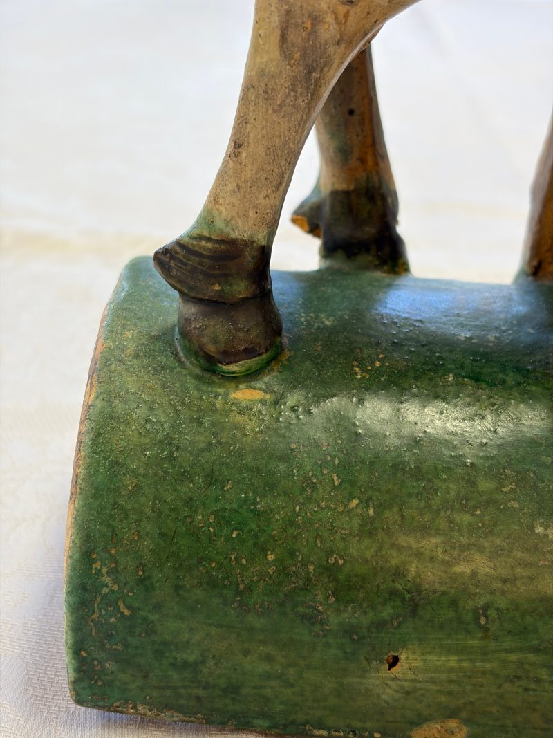A pair of Chinese sancai-glazed stoneware 'Horseriders' roof tiles on later wooden stands - 图18