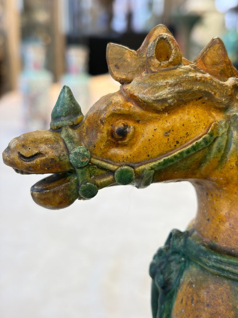A pair of Chinese sancai-glazed stoneware 'Horseriders' roof tiles on later wooden stands - 图29