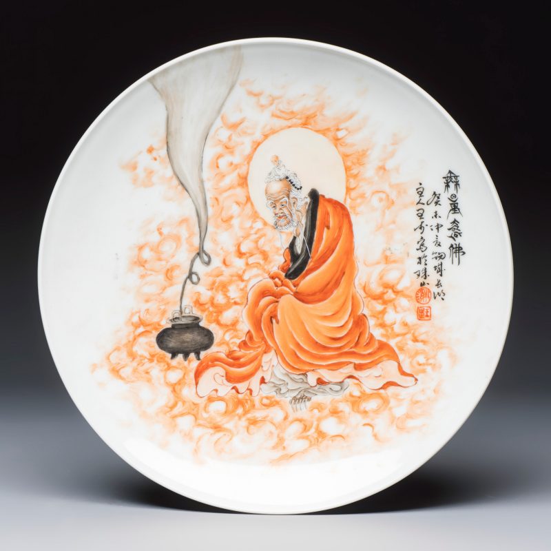 A Chinese iron-red and grisaille-decorated dish