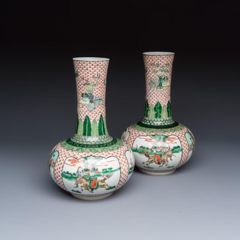 A pair of Chinese famille verte bottle vases with narrative design