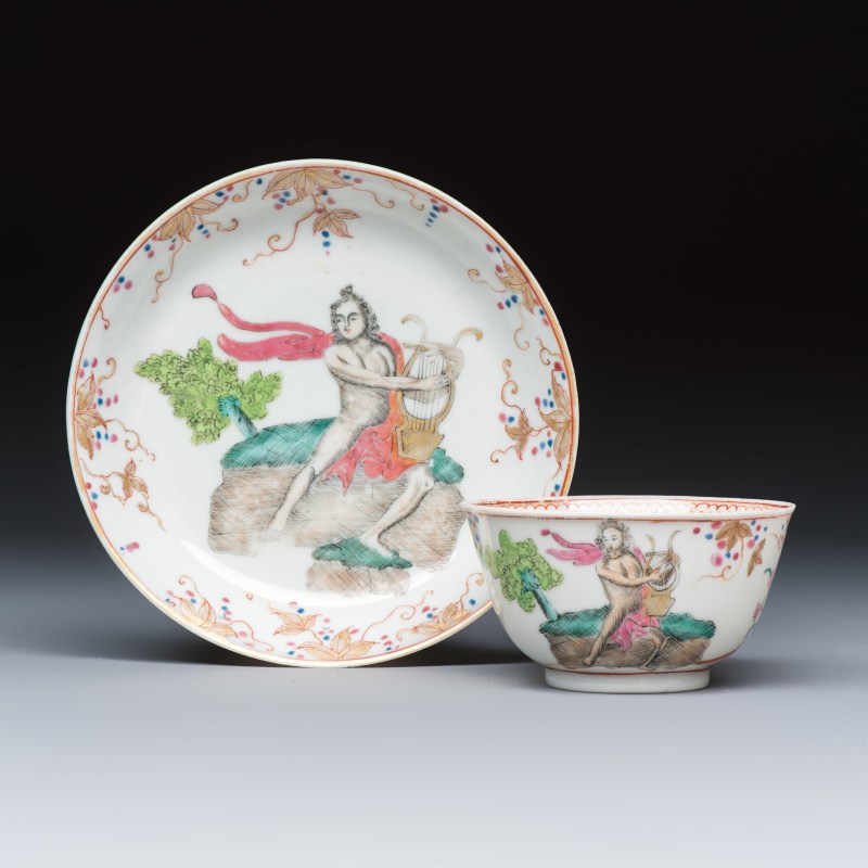 A rare Chinese famille rose export tea bowl and saucer with 'Apollo Playing the Lyre'