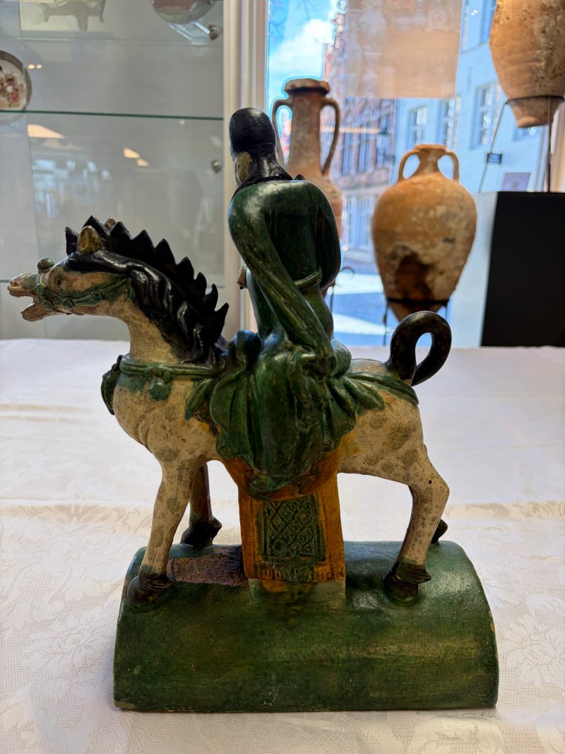 A pair of Chinese sancai-glazed stoneware 'Horseriders' roof tiles on later wooden stands - 图19