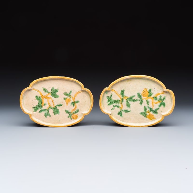 A pair of Chinese sancai-glazed stoneware quadrilobed trays with fruiting branches
