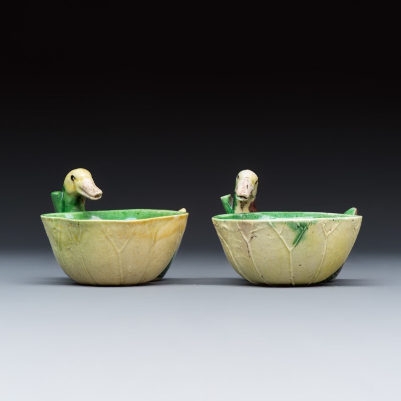 A pair of Chinese famille verte sancai biscuit duck-and-lotus-form water droppers on later wooden stands - 图2